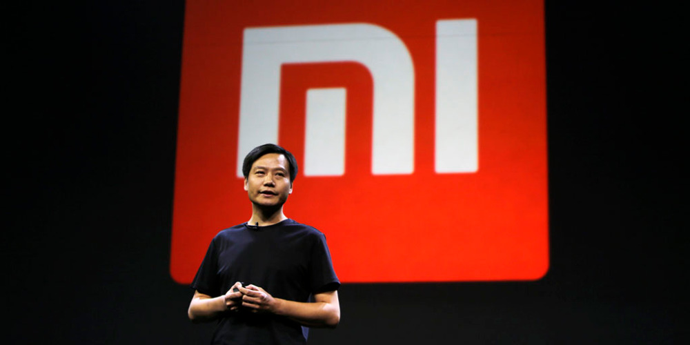 Lei Jun, founder and CEO of China's mobile company Xiaomi, speaks at a launch ceremony of Xiaomi Phone 4, in Beijing, July 22, 2014. China's Xiaomi unveiled on Tuesday its new flagship Mi 4 smartphone, aimed squarely at the premium handset market dominated by Apple Inc and Samsung Electronics Co Ltd. REUTERS/Jason Lee (CHINA - Tags: BUSINESS TELECOMS SCIENCE TECHNOLOGY LOGO) - RTR3ZN52
