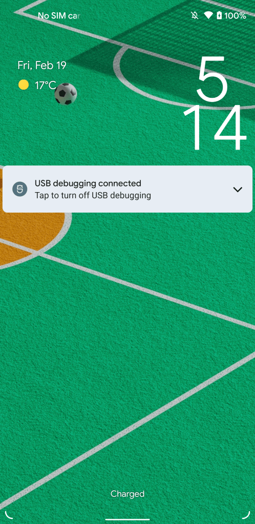 Android 12 lockscreen redesign with large clock and a notification