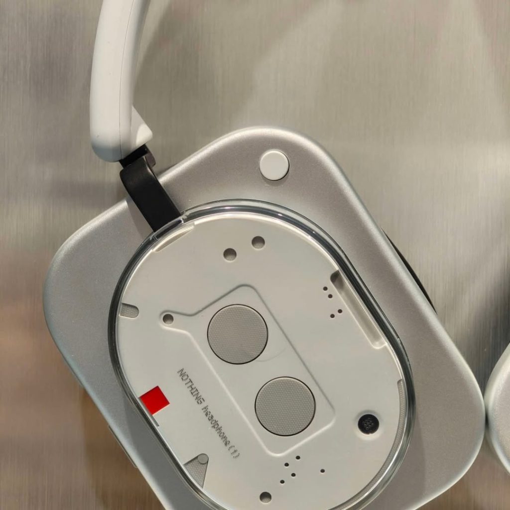 Nothing Headphones (1) with a focus on a single earcup.