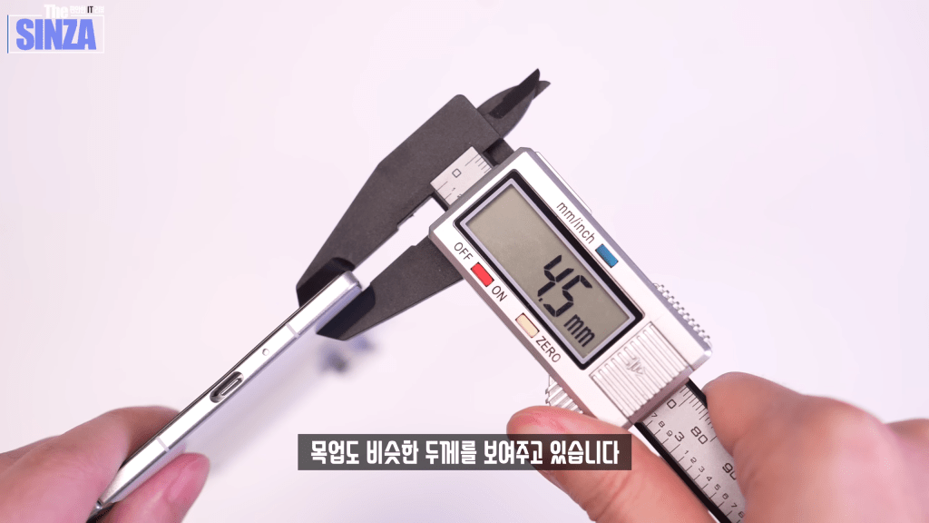 The Z Fold 7 dummy unit being measured for thickness when open